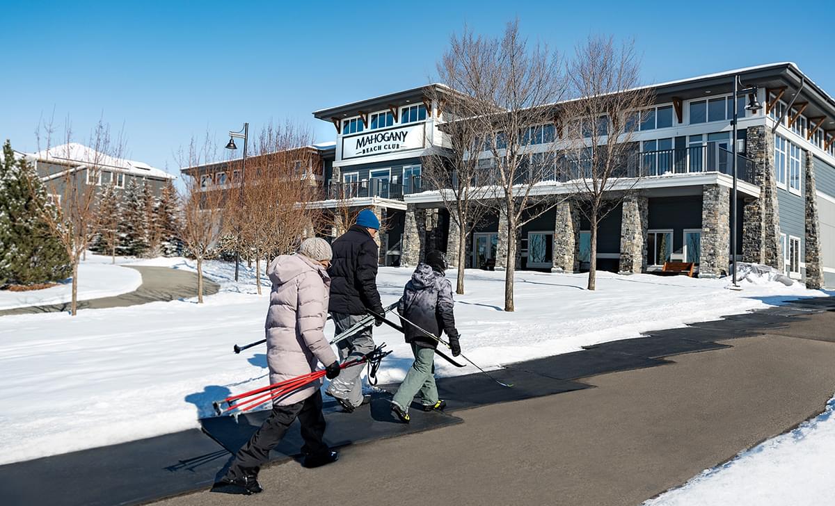 Family with skis at Beach Club
