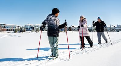 Family on ski path